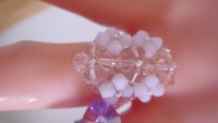 anillo siete flores cristal y blanco opaco 0443