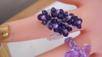 ANILLO SEIS FLORES  COLOR PURPEL VIOLETA